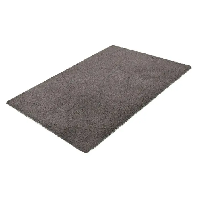 Badteppich Happy - 40 x 60 cm, Grau, 100% Polyester - Nahaufnahme eines weichen, grauen Teppichs, der ein Gefühl von Komfort und Wärme vermittelt. Ideal für Wohnzimmer oder Schlafzimmer.