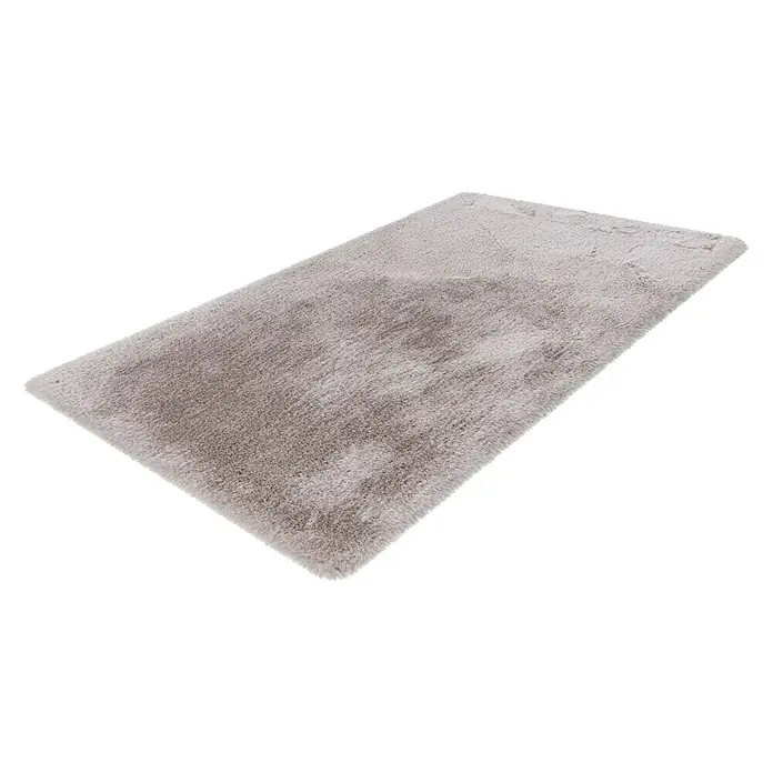Badteppich Happy - 67 x 110 cm, Silber, 100% Polyester - Dieser weiche, graue Teppich bringt Komfort und Stil in jeden Raum. Ideal für Wohnzimmer oder Schlafzimmer, bietet er eine angenehme Textur.