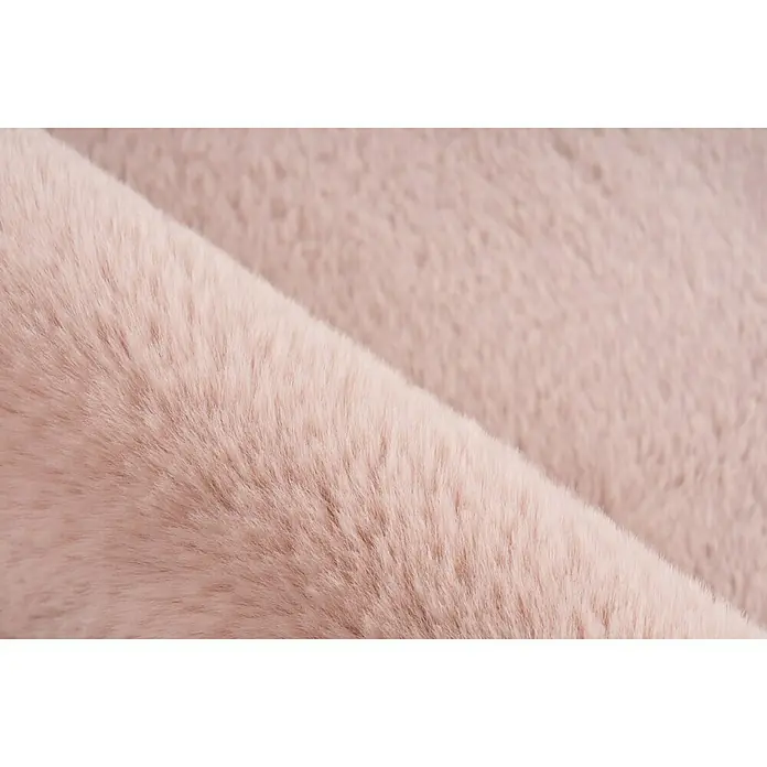 Badteppich Happy - 40 x 60 cm, Rosa, 100% Polyester - Nahaufnahme von weichem, roséfarbenem Kunstfellstoff, ideal für kuschelige Accessoires und Heimtextilien.