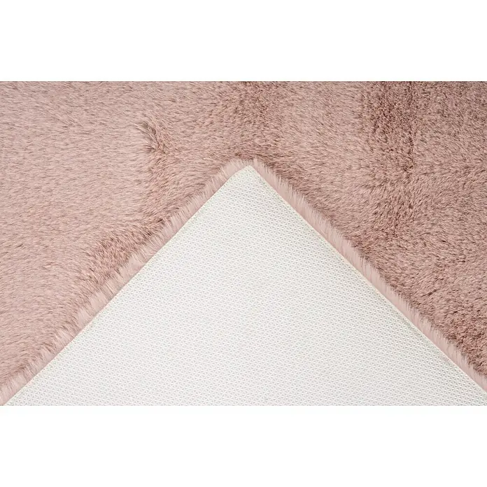 Badteppich Happy - 40 x 60 cm, Rosa, 100% Polyester - Nahaufnahme eines rosa Teppichs, der die weiche Textur und die rutschfeste Unterseite für Komfort und Sicherheit zeigt.