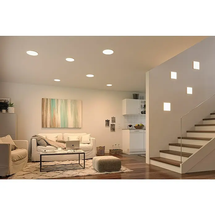 Paulmann LED-Panel Veluna VariFit - 17 W, L x B x H: 18,5 x 18,5 x 3,1 cm, Satin, Warmweiß - Ein helles Wohnzimmer mit moderner Beleuchtung: Deckenleuchten und Wandleuchten sorgen für eine angenehme Atmosphäre.