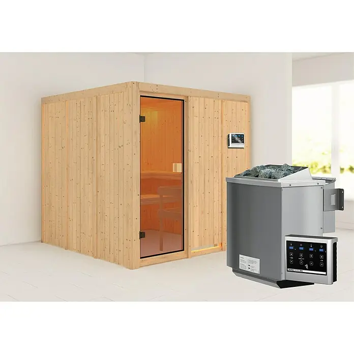 Karibu Elementsauna Oulu - Mit 9 kW Bio-Ofen mit externer Steuerung, L x B x H: 196 x 196 x 198 cm - Abbildung einer Sauna mit Glasfront und einem externen Saunaofen mit Steinen, neben einem weißen Hintergrund.