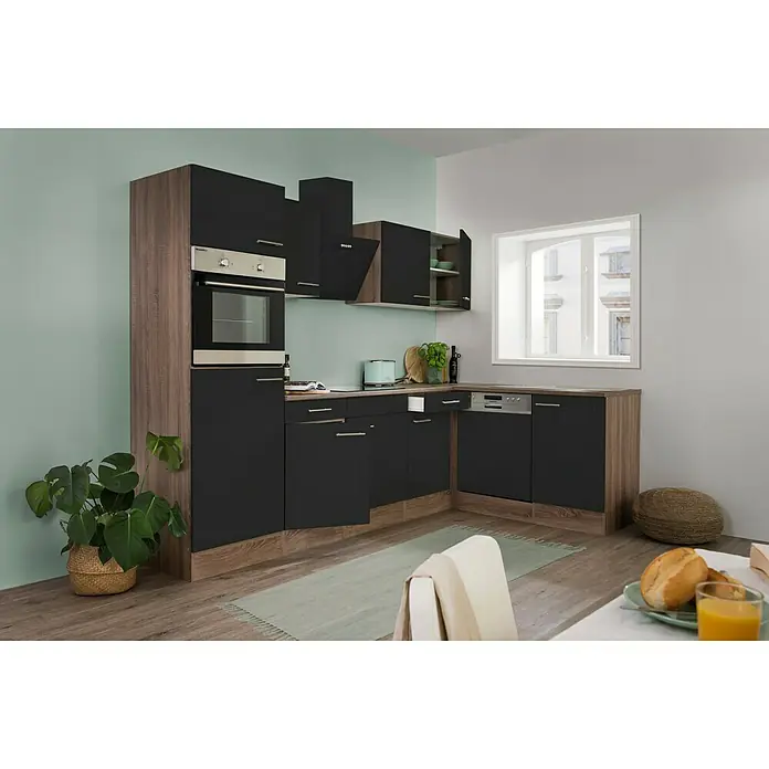 Respekta Winkelküche Oliver - B x T: 280 x 172 cm, Schwarz, Mit Elektrogeräten - Bild eines modernen Küchensets in Schwarz und Holzoptik mit eingebauten Geräten und Akzentpflanze.