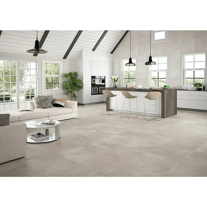 Pavimento porcelánico Rodano - 75 x 75 cm, Taupe, Rectificado, C-3 Antideslizante - Interior luminoso con baldosas de gran formato que realzan el espacio y crean un ambiente moderno y abierto.