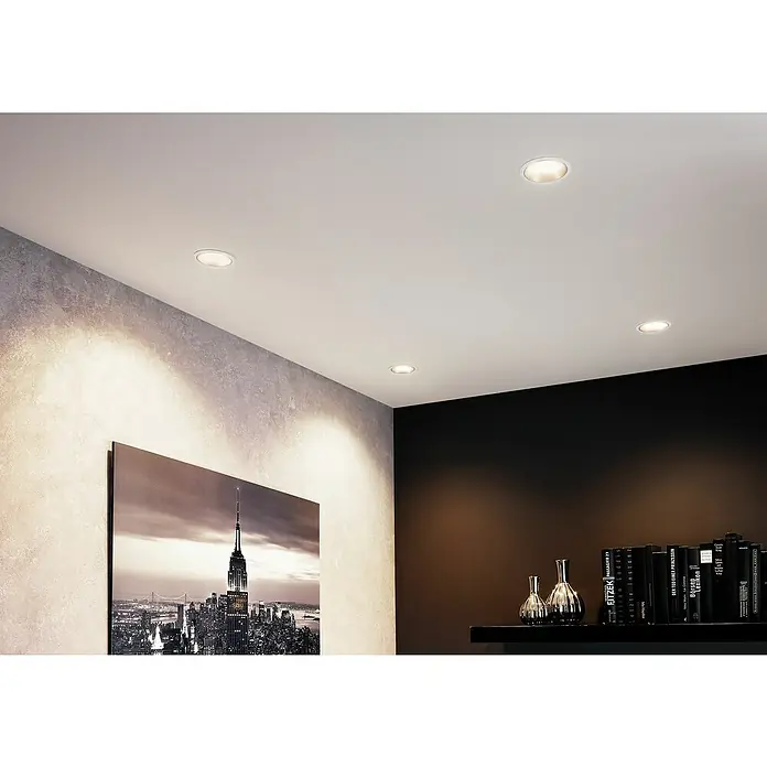 Paulmann Downlight LED empotrable Cole - 6,5 W, Blanco/Dorado, Blanco cálido, 1 ud. - Primer plano de luces LED empotradas en el techo que iluminan una habitación con decoración moderna. Diseño de iluminación elegante y eficiente.