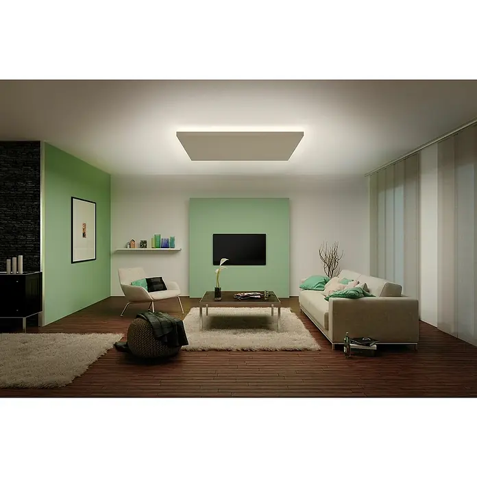 Paulmann MaxLED 1.000 Tira LED - 2,5 m, Blanco cálido - Salón con lámpara de techo moderna, sofá, sillón, alfombra y suelos de madera oscura. La lámpara de techo proporciona una luz cálida.