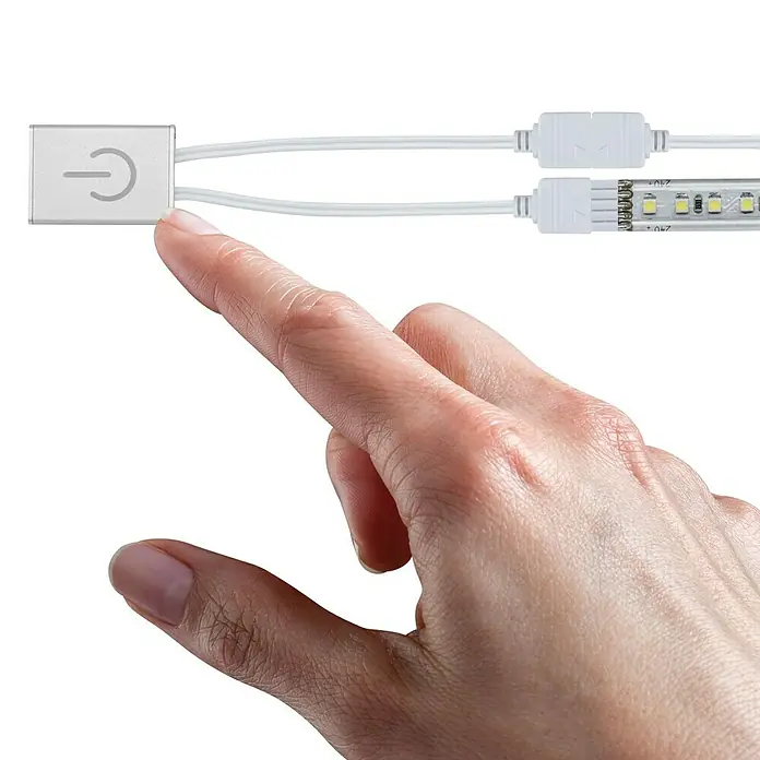 Paulmann MaxLED Controlador de intensidad y conmutación Touch Switch - Plateado, 144 W - Primer plano de una tira de luz LED con sensor táctil para el control de la luz, combinando iluminación innovadora y facilidad de uso.