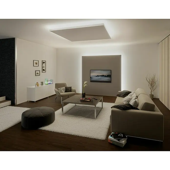 Paulmann MaxLED Stromeinspeisung Power Supply 40VA DC - B x H: 52 x 24 mm, Weiß - Ein modern eingerichtetes Wohnzimmer mit einem bequemen Sofa, einem Couchtisch und einem eleganten, quadratischen Deckenlicht.
