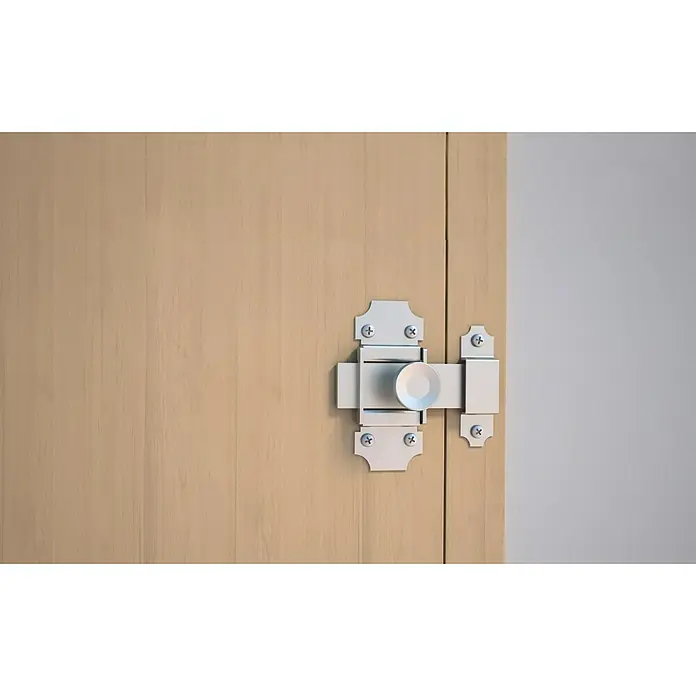 Abus Pestillo deslizante DRR30 Z - Largo: 75 mm, Acero - Vista detallada de un cerrojo deslizante de metal en una puerta de madera clara, fijado con tornillos. Ideal para seguridad interior.