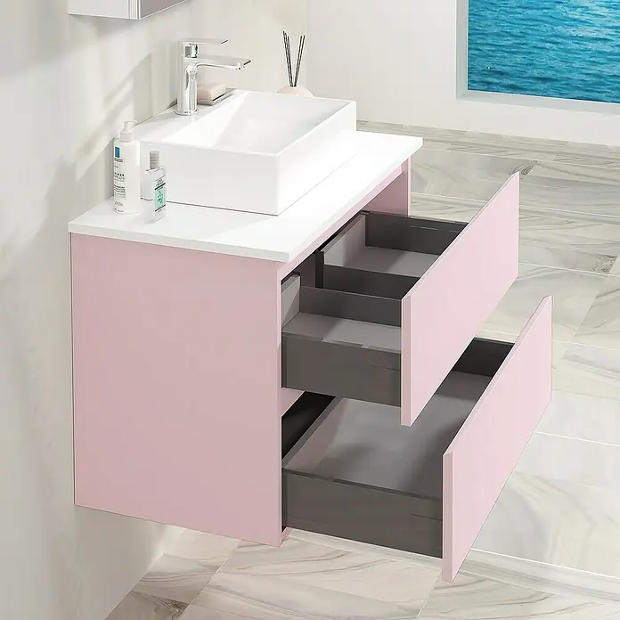 Artysan Mueble bajo de lavabo Fons - 46 x 100 x 56 cm, Rosa - Mueble de baño moderno con armario rosa, lavabo blanco y cajones abiertos. Un diseño elegante para interiores de baño con estilo.