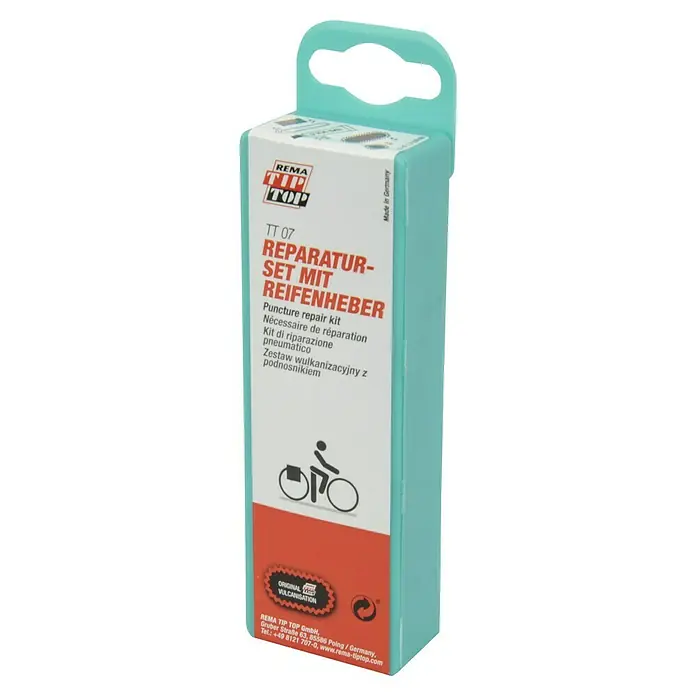 Tip-Top Fahrrad-Flickzeug - 9 -tlg. - Ein REMA TIP TOP TT 07 Reparatur-Set mit Reifenheber in einer türkisblauen Verpackung, ideal für unterwegs bei Fahrradpannen.