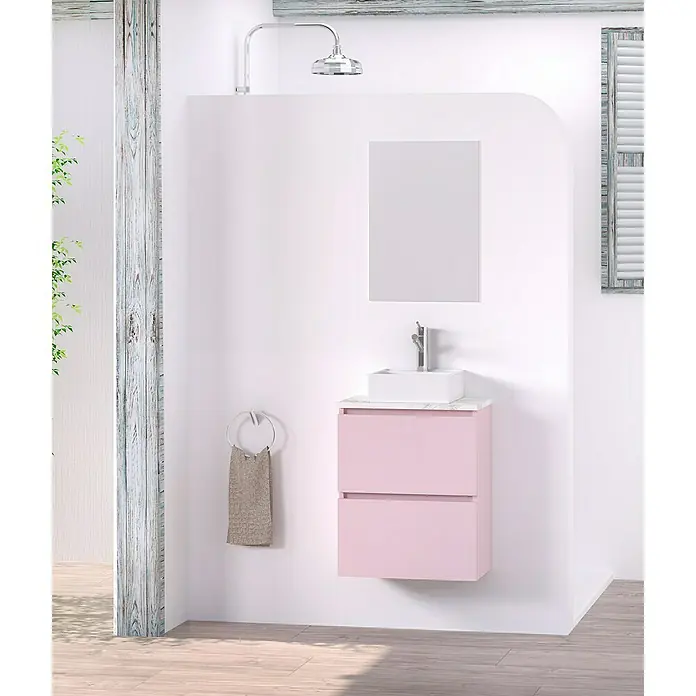 Artysan Conjunto de mueble de baño Picolo - Rosa, Mate - Mueble de baño rosa con dos cajones, lavabo blanco y toallero en un baño moderno.