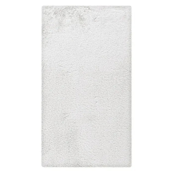 Badteppich Happy - 50 x 90 cm, Weiß, 100% Polyester - Ein weicher, weißer Teppich mit zotteliger Textur, ideal für gemütliche Wohnräume. Der Teppich bietet Komfort und eine warme Atmosphäre.
