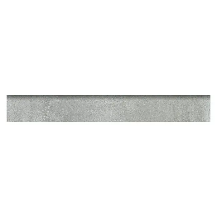 Zócalo cerámico Madox - 7,2 x 60 cm, Antracita, 18 ud. - Primer plano de un elemento de piedra rectangular gris, destacando su textura rugosa y elegancia minimalista. Ideal para proyectos de diseño moderno.