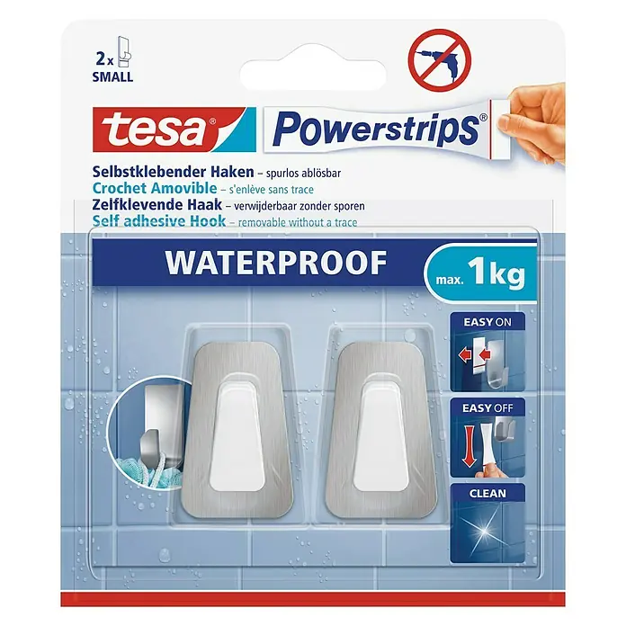 Tesa Powerstrips Wandhaken - 2 Stk., Rechteckig, Metall, Klein - Bild einer Verpackung Tesa Powerstrips Selbstklebende Haken, die wasserfest und bis zu 1 kg belastbar sind.