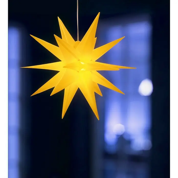 Estrella LED 3D - 25 cm, Amarillo, Funciona con pilas - La luz de estrella de papel amarillo brillante con sus muchas puntas ilumina la habitación y crea un ambiente festivo.
