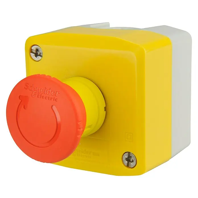 Schneider Electric Notausschalter - Gelb/Rot, Glänzend, Kunststoff, Aufputzmontage, Schutzart: IP20 - Nahaufnahme eines gelben Not-Aus-Tasters von Schneider Electric mit rotem Betätigungsknopf und Schrauben an den Ecken.