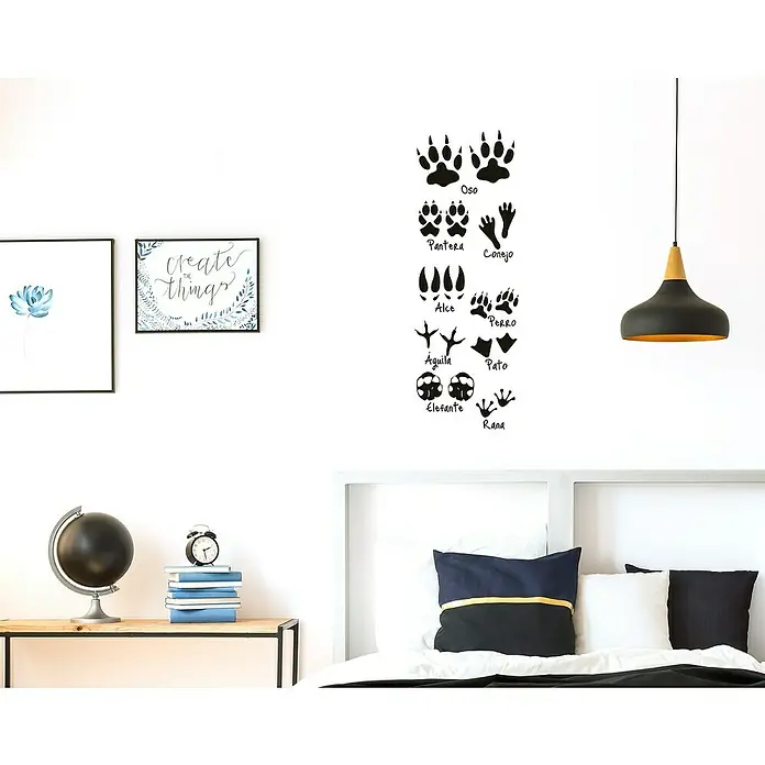 Vinilo de pared Huellas - Plástico - Vinilo decorativo de pared con huellas de animales en negro, incluyendo oso, lobo y elefante, ideal para decorar habitaciones infantiles.