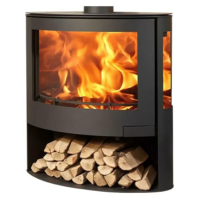 Panadero Estufa de leña Iris - 7,8 kW, Volumen de calefacción: 240 m³, Negro - Estufa de leña gris oscuro con paneles de cristal mostrando llamas activas y un área de almacenamiento de leña integrada con troncos.