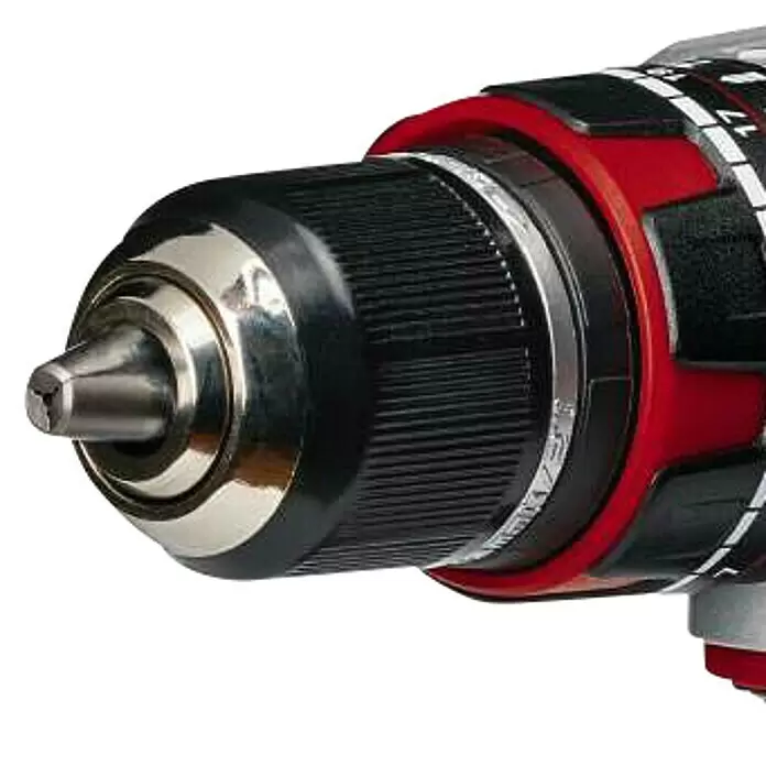 Einhell Professional PXC 18V Taladro atornillador percutor de batería TE-CD 18 Li-i BL - 18 V, 2 baterías, 60 Nm - Primer plano de un portabrocas de taladro plateado y negro, con partes del cuerpo rojo y negro visibles.