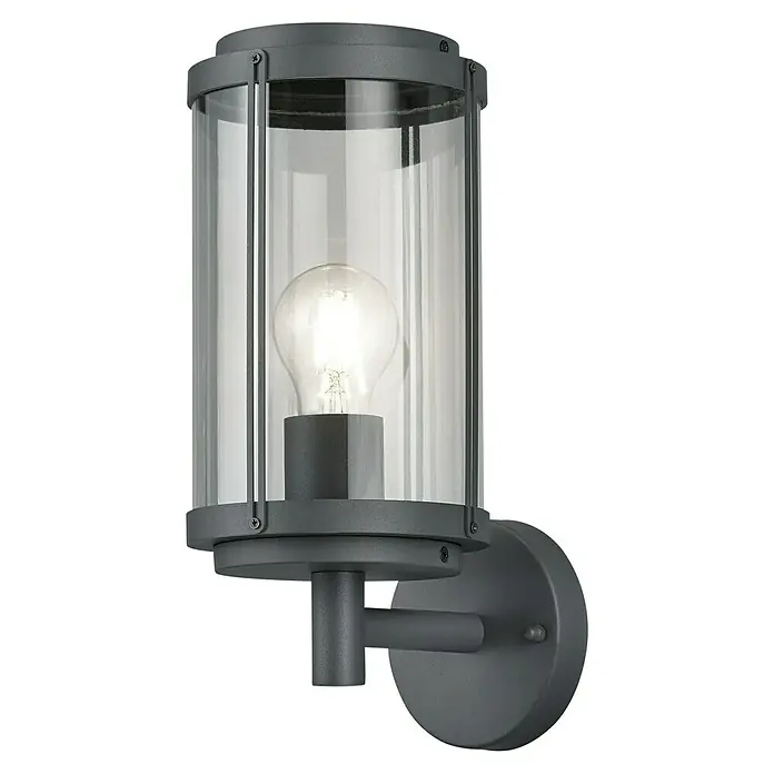 Trio Leuchten Außenwandleuchte TANARO - 40 W, L x B x H: 18,5 x 14,5 x 32,5 cm, Anthrazit, IP44 - Nahaufnahme einer grauen Außenwandleuchte mit klarem Glaszylinder und sichtbarer Glühbirne, die ein warmes Licht ausstrahlt.