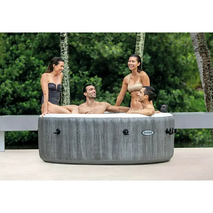 Intex Pure Spa Hidromasaje móvil Greywood Deluxe - Ø x Al: 196 x 71 cm, Gris/Blanco, 795 l - ¡Disfruta de pura relajación con la bañera de hidromasaje Intex! El spa hinchable tiene capacidad para cuatro personas, ideal para terrazas y jardines.