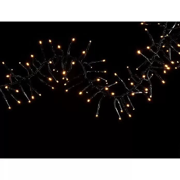 Tween Light LED-Clusterlichterkette - Außen, Länge: 12,4 m, 1.000 Stk., Netzbetrieben, Lichtfarbe: Bernstein - Leuchtende, warmweiße LED-Cluster-Lichterkette mit dunklen Kabeln.