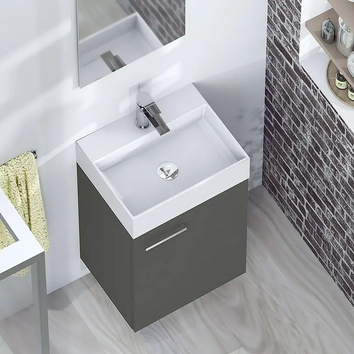 Artysan Conjunto de mueble de baño Mini - Ancho: 40 cm, Antracita, Apertura una puerta - Primer plano de un baño moderno con un mueble de lavabo gris, un lavabo y un grifo, todo sobre un fondo de pared de ladrillo.