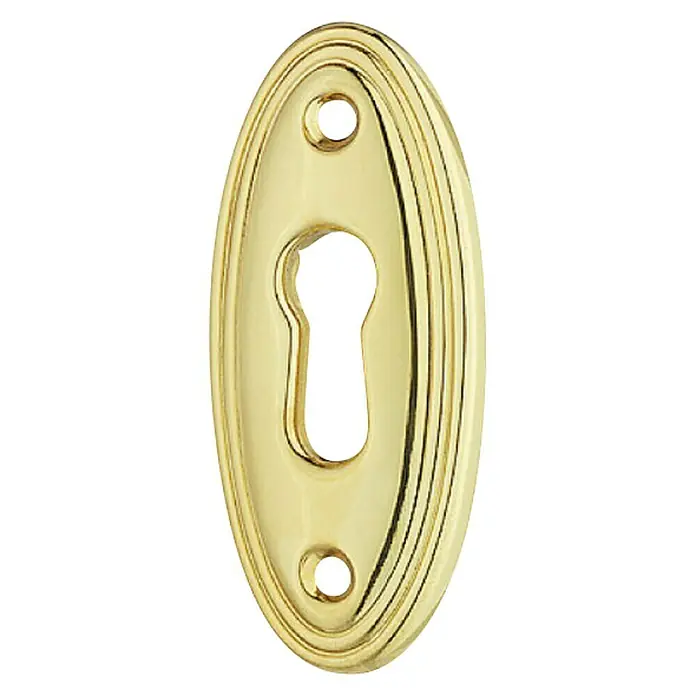 Stabilit Escudo para cerraduras Brillo - Dorado, L x An x Al: 42 x 20 x 2 mm - Primer plano de una cubierta de ojo de cerradura dorada con un diseño ovalado y agujeros para tornillos sobre un fondo negro.