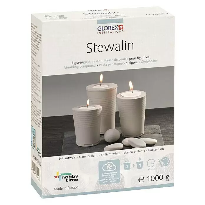 Glorex Modelliermasse Stewalin - 1 kg, Weiß - Weiße Schachtel Stewalin Gießmasse für Figuren, mit Bild von weißen Kerzenhaltern und Steinen aus dem Produkt.