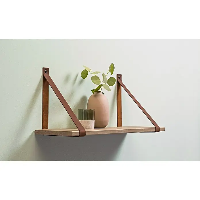 Regalhalter2 Stk., Leder, Traglast Einlegeboden: 12 kg - Ein stilvolles Wandregal mit Lederriemenaufhängung, auf dem eine Vase und ein Glasgefäß stehen, vor einem mintgrünen Hintergrund.