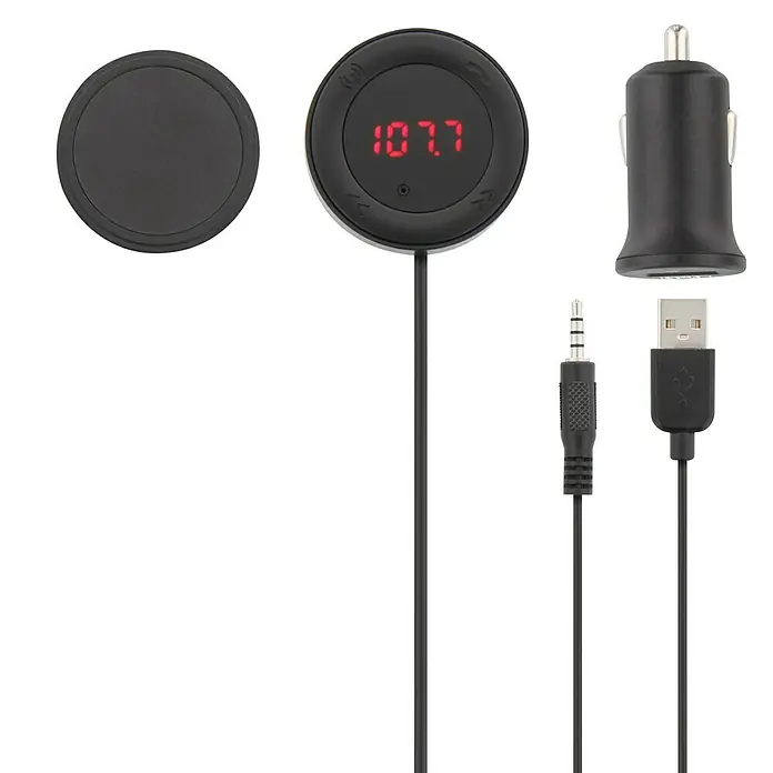 T'nB Kit manos libres con cable Jack - Frecuencia: 50 Hz - 16 Hz - Imagen de un transmisor FM inalámbrico para coche con puerto de carga USB, cable AUX y adaptador de coche sobre un fondo negro.