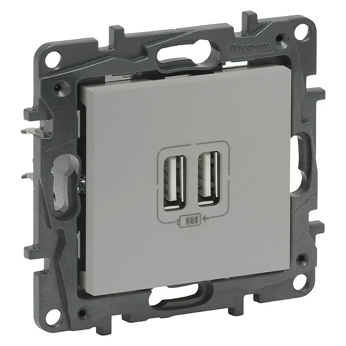 Legrand Niloé Step Toma USB - Aluminio, x 2, Plástico, Instalar - Primer plano de una toma de pared USB doble Legrand en gris, perfecta para cargar dispositivos. Diseño elegante para interiores modernos.