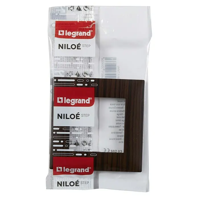 Legrand Niloé Step Marco - Madera, Modelo de mecanismos: x 1, Plástico, Instalar - Primer plano de una tapa de enchufe Legrand Niloe Step con efecto madera, empaquetada.