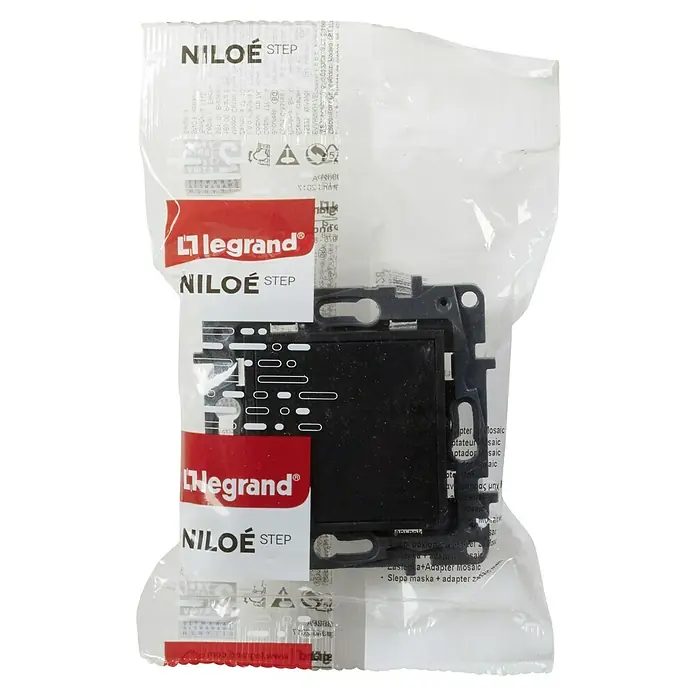 Legrand Niloé Step Tapa para mecanismo - Antracita, Metal, Montaje en la pared - Primer plano de un Adaptador Mosaic Legrand Niloe Step en un embalaje transparente, ideal para instalaciones eléctricas.