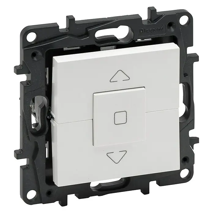 Legrand Niloé Step Interruptores para persianas - Blanco, Mate, Montaje en superficie - Un interruptor de persiana Legrand en blanco con flechas arriba y abajo y un símbolo de stop, enmarcado en negro.