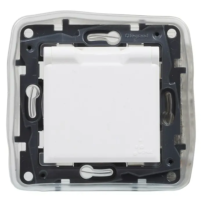Legrand Niloé Step Enchufe con tapa - Blanco, Montaje en la pared - Un interruptor de luz cuadrado y blanco de Legrand, con montaje gris y marco transparente.