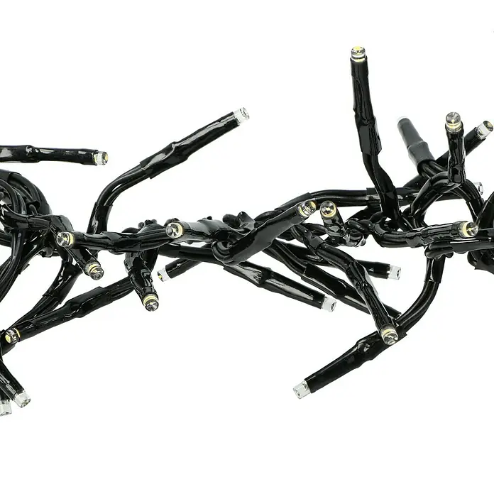 Tween Light Cadena de luces LED - Para exterior, Largo: 8,15 m, 768 ud., Funcionamiento en red, Color de luz: Blanco cálido - Un primer plano de una hilera de luces con cables negros y bombillas pequeñas y transparentes sobre un fondo blanco.