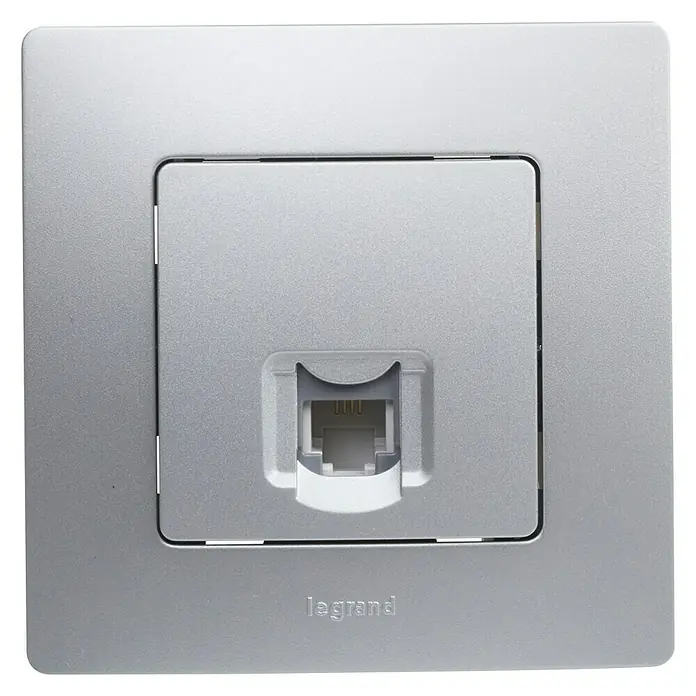 Legrand Niloé Monoblock Toma de teléfono RJ11 - Plateado, Instalar - Primer plano de una toma de teléfono de pared Legrand plateada con una placa frontal cuadrada, perfecta para oficinas y hogares modernos.