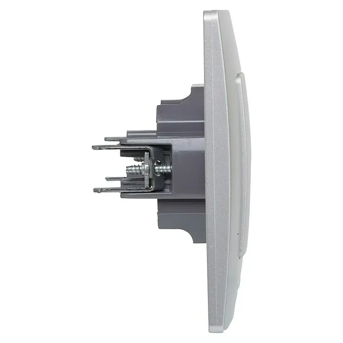 Legrand Niloé Monoblock Toma de teléfono RJ11 - Plateado, Instalar - Vista lateral de un interruptor de luz gris, que muestra su mecánica interna y los herrajes de montaje para la instalación.