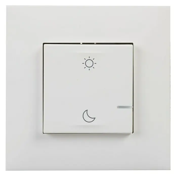 Legrand Valena Next with Netatmo Conmutador Día/Noche - Blanco, Montaje en la pared - Interruptor con iconos de modo día y noche. El interruptor está montado en una pared blanca y tiene un diseño moderno y minimalista.