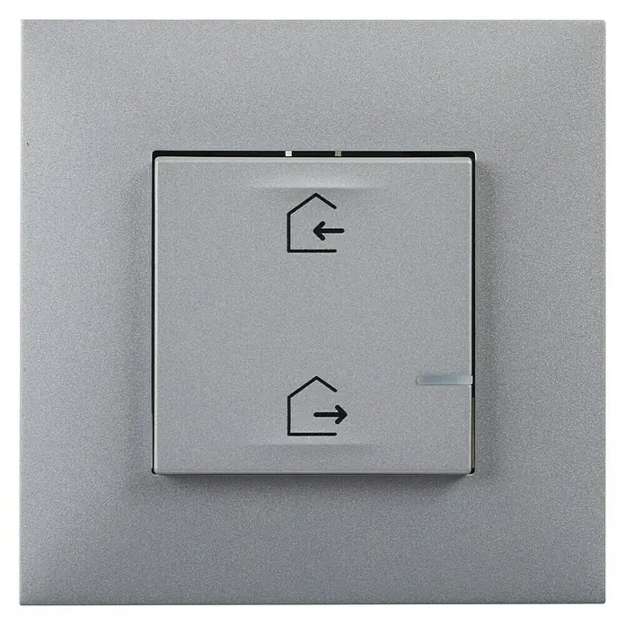 Legrand Valena Next with Netatmo Conmutador - Aluminio, Montaje en la pared, 16 A - Primer plano de un interruptor plateado con símbolos de casa y flecha, empotrado en una placa a juego, para controlar persianas o contraventanas.