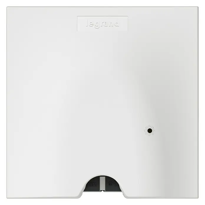 Legrand Valena Next with Netatmo Pasacables - Blanco - Primer plano de una cubierta Legrand blanca, que muestra una estética limpia y minimalista con una textura sutil y el logotipo de la marca.
