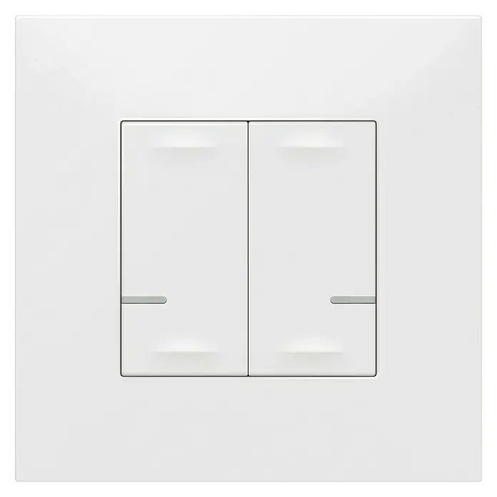 Legrand Valena Next with Netatmo Conmutador inalámbrico - Plástico, Blanco - Primer plano de una placa de interruptor de luz doble blanca con interruptores planos modernos y detalles de diseño sutiles, que ofrece una solución de iluminación elegante.