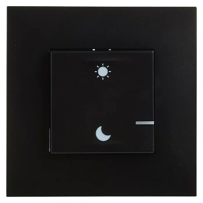 Legrand Valena Next with Netatmo Conmutador Día/noche - Negro, Mate, Montaje en la pared - La imagen muestra un interruptor de luz negro con pantalla táctil para controlar la iluminación, marcado con iconos de sol y luna.