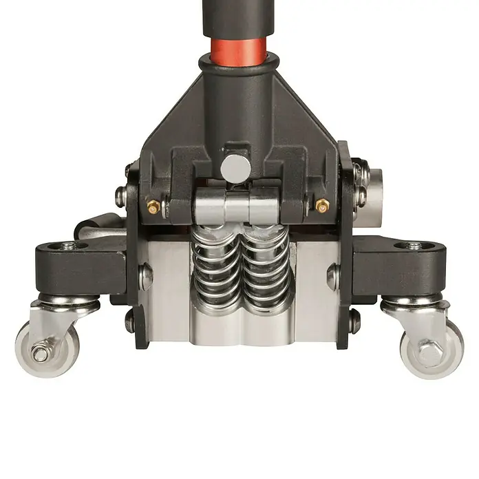 Bahco Hydraulischer Rangierwagenheber - Hubhöhe: 85 mm - 415 mm - Detailaufnahme des mechanischen Teils einer Hebebühne, mit Federn und Rollen für Stabilität und Bewegung.