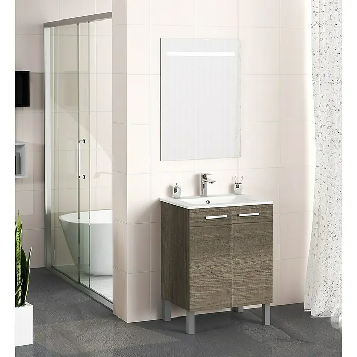 Artysan Mueble bajo de lavabo Fran - An x Pr x Al: 60 x 46 x 85 cm, Nebraska - Un moderno lavabo de baño con espejo y mueble inferior de color madera sobre un suelo gris. El lavabo está equipado con grifo.
