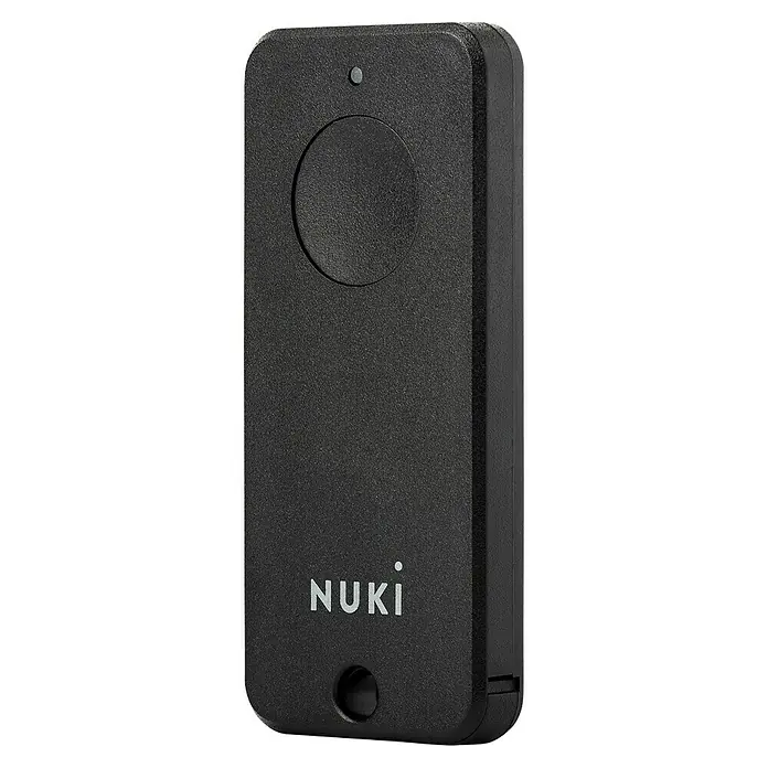 Nuki Fernbedienung FOB - L x B x H: 6 x 55 x 24 mm - Abgebildet ist eine schwarze Nuki Fernbedienung. Sie hat einen Knopf und das Nuki Logo ist zu sehen. Ideal für den Alltag.