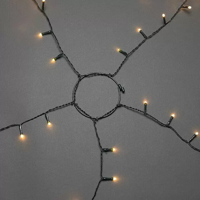 Konstsmide Baummantel - Innen, 2,4 m, 5 Stränge à 40 gefrostete bernsteinfarbene LEDs - Dunkelgrüne LED-Lichterkette mit warmweißen Glühbirnen, die sich von einem zentralen Ringverteiler ausfächern.