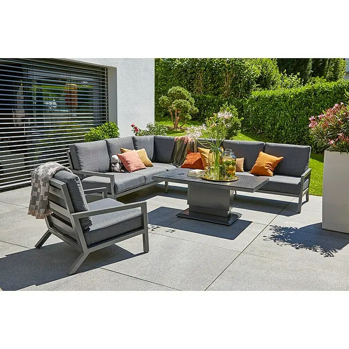 Sunfun Maja Sofá de conjunto - Aluminio, Antracita - Conjunto de muebles de jardín con sofá esquinero gris, sillón y mesa en un patio.